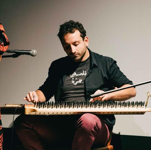 Camille El Feghali playing the qanun